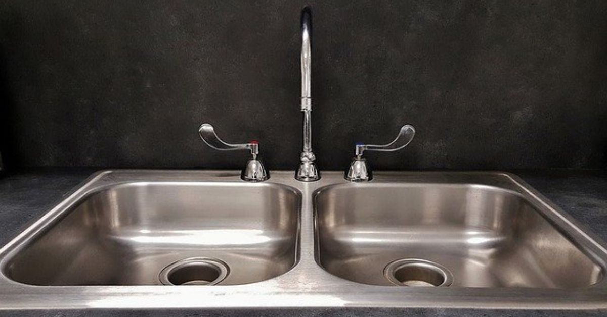 slow draining kitchen sink