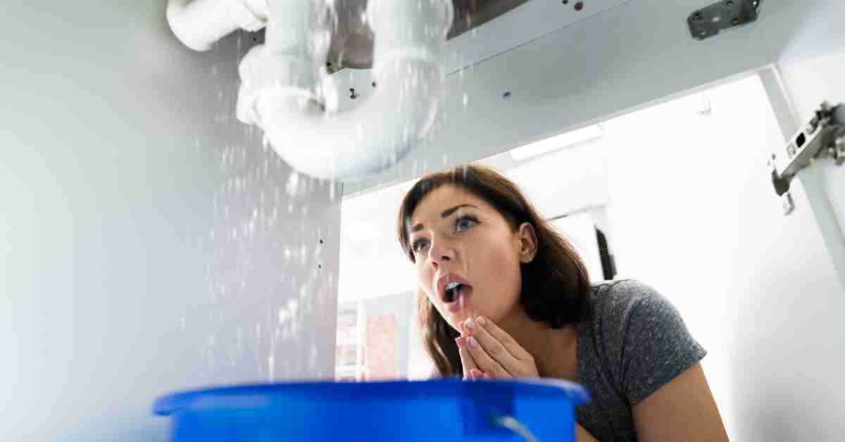 water leak under kitchen sink that may be covered by homeowners insurance