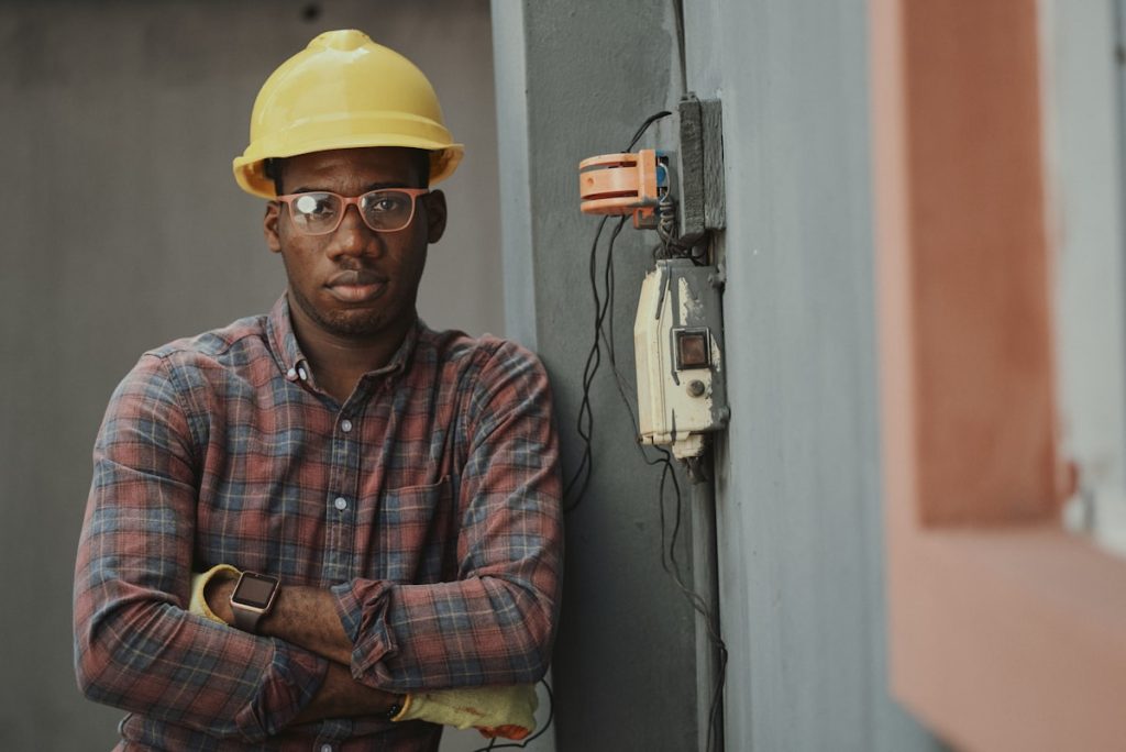 plumber repairing damaged water supply line pipe