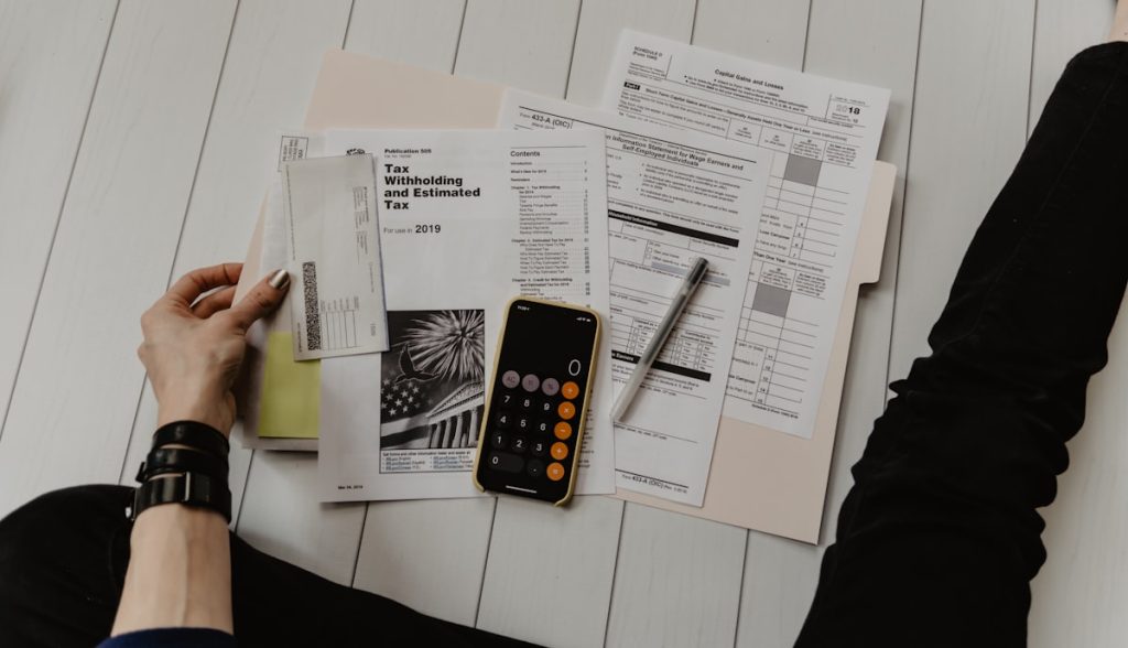 homeowner reviewing financing options and budget for plumbing repair costs